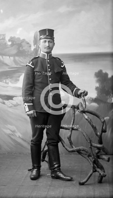An army lance-corporal in uniform and boots with spurs, Landskrona, Sweden, 1910. Artist: Unknown
