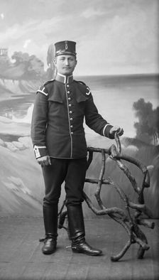 An army lance-corporal in uniform and boots with spurs, Landskrona, Sweden, 1910