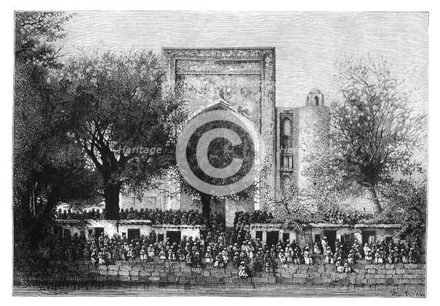 An assembly before the mosque in Bukhara, Uzbekistan, 1895.Artist: Armand Kohl