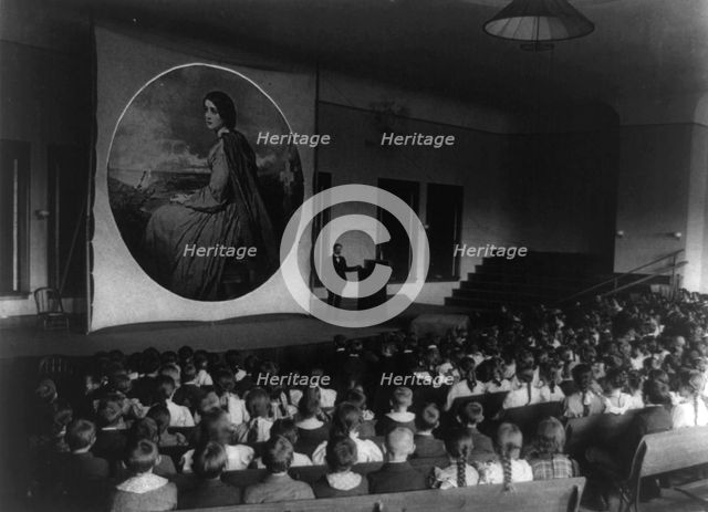 An Assembly in the auditorium for a lecture with slides on art, (1899?). Creator: Frances Benjamin Johnston.