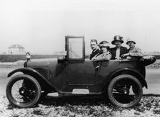 An Austin Seven Chummy with passengers, 1925