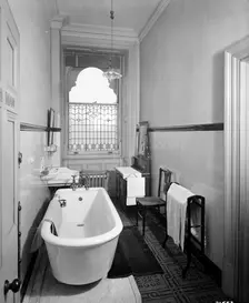 An early bathroom in the Grand Hotel, Northumberland Avenue, London, 1912. Artist: Bedford Lemere and Company