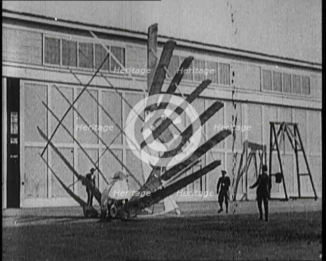 An Early Seven Winged Plane Collapsing in on Itself During Take Off, 1922. Creator: British Pathe Ltd.