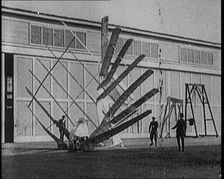 An Early Seven Winged Plane Collapsing in on Itself During Take Off, 1922. Creator: British Pathe Ltd
