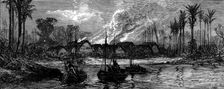 An East African slave-trading village destroyed by the boats of H.M.S Briton and Daphne, 1873. Creator: Unknown