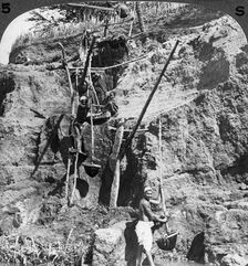 An Egyptian shaduf lifting the Nile waters to the thirsty fields, Egypt 1905.Artist: Underwood & Underwood