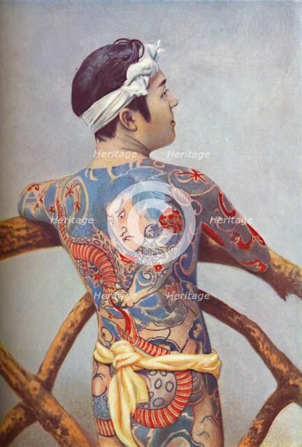 An elaborately tattooed Japanese man, 1902. Artist: Unknown.