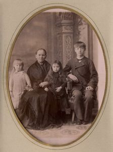 An elderly woman, a young man in a civilian suit and two.,, late 19th cent - early 20th cent. Creator: PA Milevskii