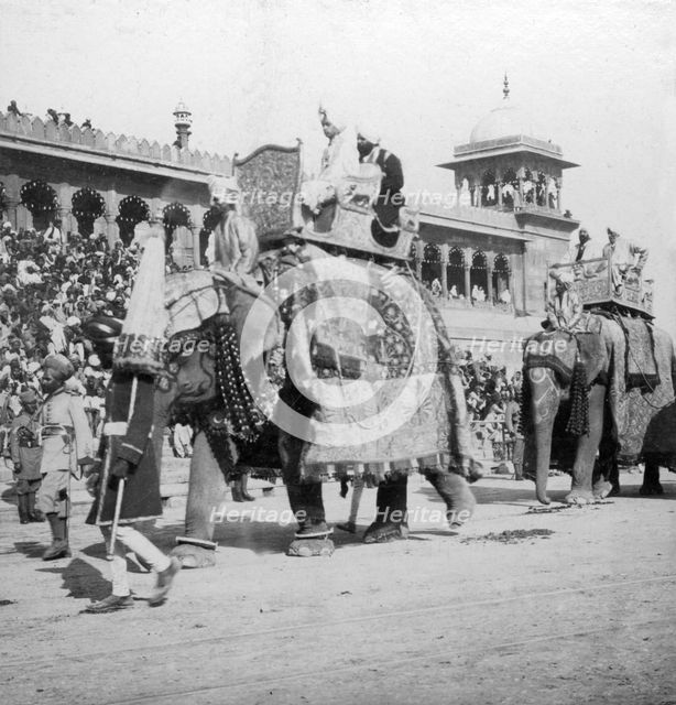 An elephant procession passing Jumma Masjid, Delhi, India, 1900s.Artist: H Hands & Son
