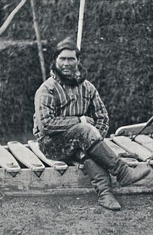 An Eskimo resting on his sledge, 1912. Artist: Pierre Petit