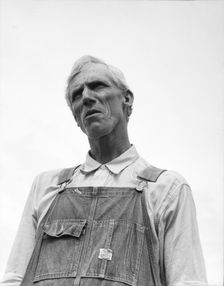 An evicted Arkansas sharecropper now settled at Hill House, Mississippi, 1936. Creator: Dorothea Lange