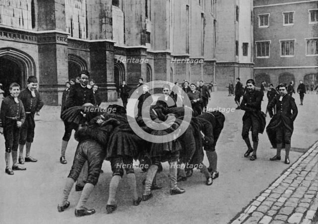 An exciting game: pupils of Christ's Hospital school, City of London, c1900 (1911). Artist: RW Thomas.