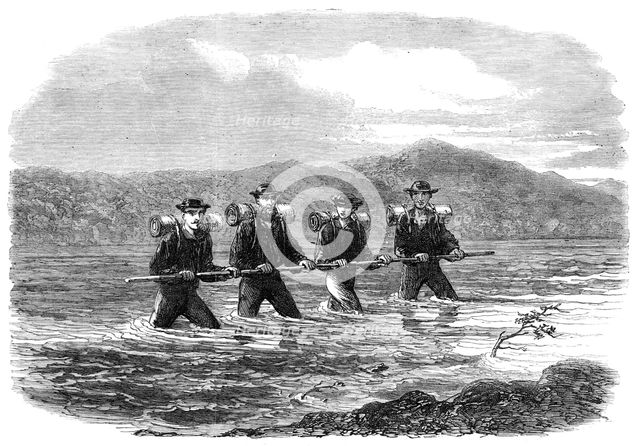 An Exploring Party on the West Coast of New Zealand: crossing the River Teramakau, 1865. Creator: Unknown.
