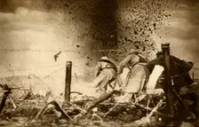 An H.E. shell exploding First World War, 1914-1918, (1933). Creator: Unknown