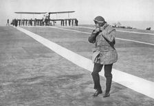 An Historic Occasion: King Edward removing his flying helmet 1936