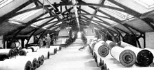 An important process in the cotton industry: a sizing-room, 1909. Creator: Unknown