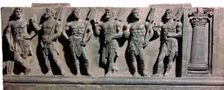 An indian sculpture of a group of marine deities, 1st century