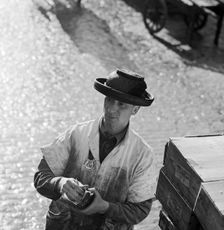 An informal portrait of a porter at Billingsgate Fish Market, City of London, c1946-c1959 Artist: John Gay