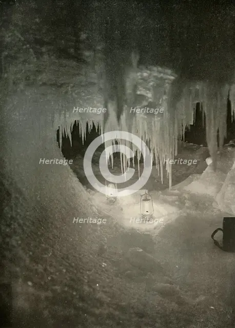 'An Ice Cavern in the Winter. Photographed by the Light of Hurricane Lamps', c1908, (1909).  Artist: Unknown.