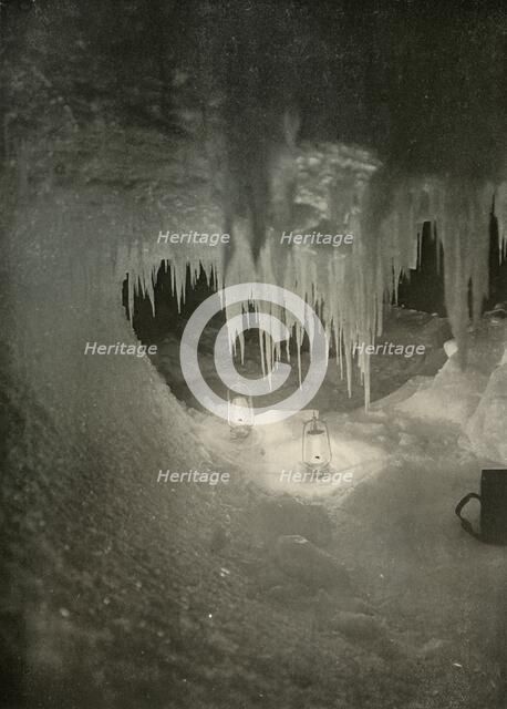 'An Ice Cavern in the Winter. Photographed by the Light of Hurricane Lamps', c1908, (1909).  Artist: Unknown.