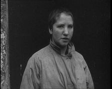 An Irish Woman Sporting a Shaved Head as Punishment for Consorting With British Soldiers, 1920. Creator: British Pathe Ltd