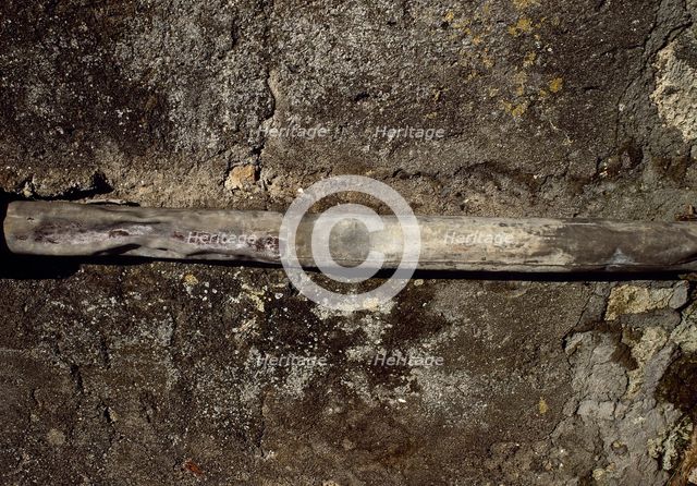 An original Roman lead pipe, Pompeii, Italy, 1st century AD. Creator: LTL.