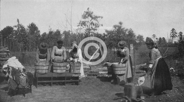 An out-of-door class in laundry work, 1904. Creator: Frances Benjamin Johnston.