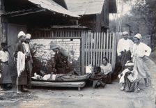 An outdoor examination of a plague patient in Mandalay, 1906. Creator: Unknown