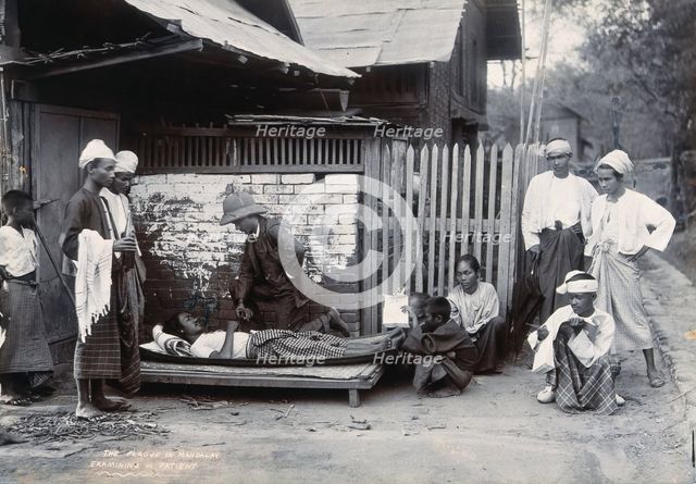 An outdoor examination of a plague patient in Mandalay, 1906. Creator: Unknown.