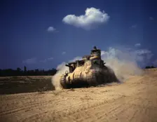 An M-3 tank in action, Ft. Knox, Ky., 1942. Creator: Alfred T Palmer