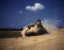 An M-3 tank in action, Ft. Knox, Ky., 1942. Creator: Alfred T Palmer