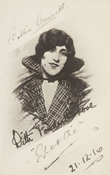 An man in drag as "Gertie" wearing a checked coat, 1916. Creator: Unknown