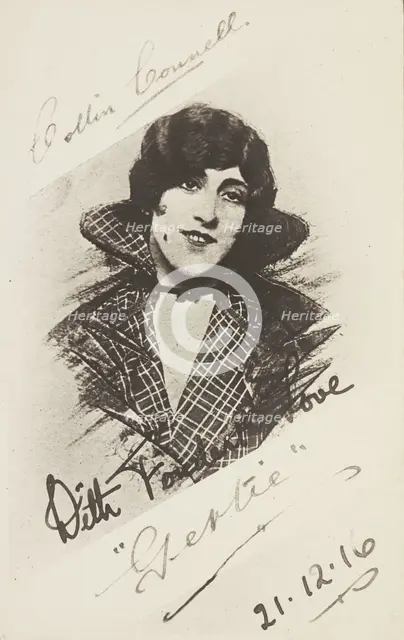 An man in drag as "Gertie" wearing a checked coat, 1916. Creator: Unknown.
