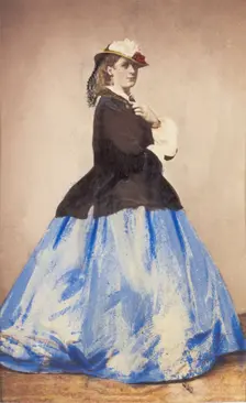 An man in drag posing side-on, 1862. Creator: Unknown