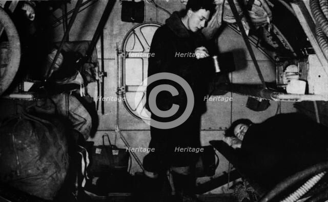 An RAF rigger serving breakfast at 6.30 am, c1940 (1943). Artist: Unknown.