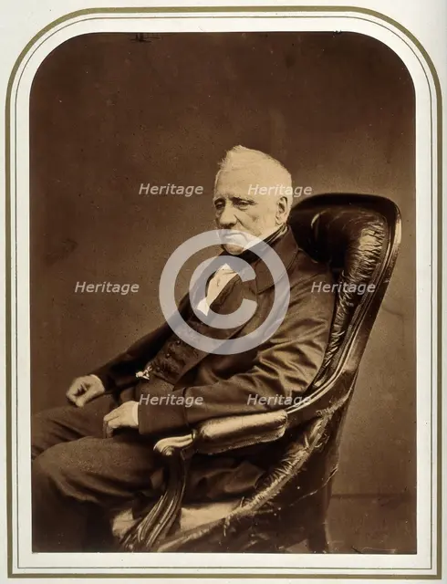 An unidentified man in an armchair. Creator: Maull & Polyblank.