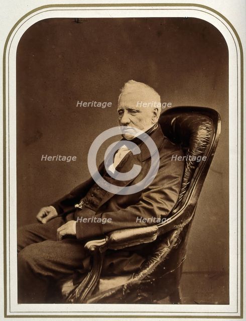 An unidentified man in an armchair. Creator: Maull & Polyblank.