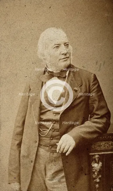 An unidentified man leaning on a cabinet, c1880s. Creator: Frederick Mulnier.