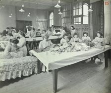 An Upholstery class for female students at Borough Polytechnic, Southwark, London, 1911
