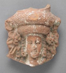 Antefix in the Form of a Female Head, Ptolemaic Period-Roman Period (305 BCE-337 CE). Creator: Unknown