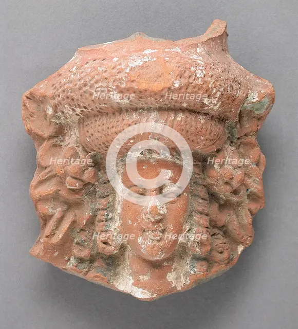 Antefix in the Form of a Female Head, Ptolemaic Period-Roman Period (305 BCE-337 CE). Creator: Unknown.