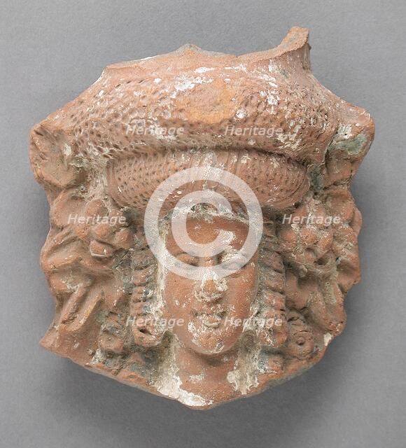Antefix in the Form of a Female Head, Ptolemaic Period-Roman Period (305 BCE-337 CE). Creator: Unknown.
