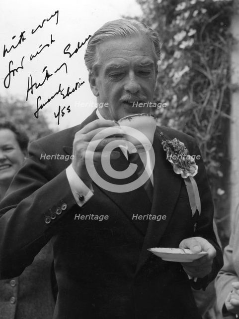 Anthony Eden, British Conservative politician, drinking a cup of tea, 1955. Artist: Unknown