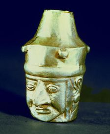 Anthropomorphic head shaped vase, made of silver and representing a hook-nosed person