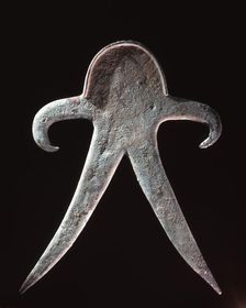 Anthropomorpic figure from a copper hoard, probably used as a cult object