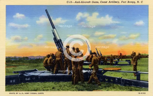 Anti-aircraft guns, Coast Artillery, Fort Bragg, North Carolina, USA, 1941. Artist: US Army Signal Corps