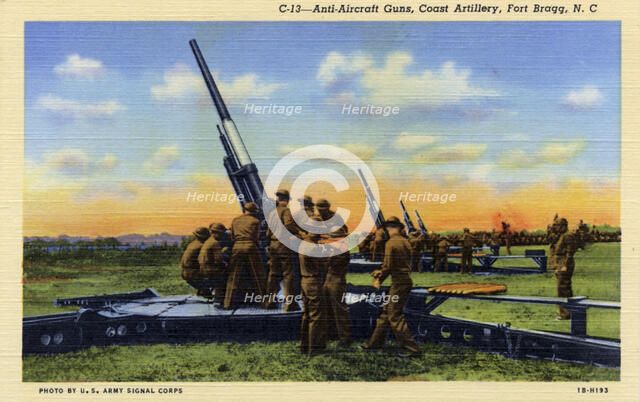 Anti-aircraft guns, Coast Artillery, Fort Bragg, North Carolina, USA, 1941. Artist: US Army Signal Corps