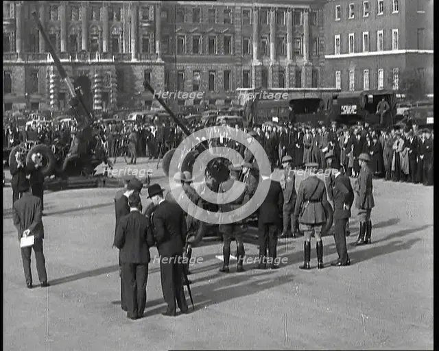 Anti-Aircraft Guns in Horseguard's Parade With Army Officers Attending and Bystanders Look..., 1937. Creator: British Pathe Ltd.