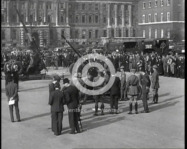 Anti-Aircraft Guns in Horseguard's Parade With Army Officers Attending and Bystanders Look..., 1937. Creator: British Pathe Ltd.