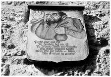 Anti-semitism: medieval inscription on the town wall, Rothenburg, Germany, (1956)